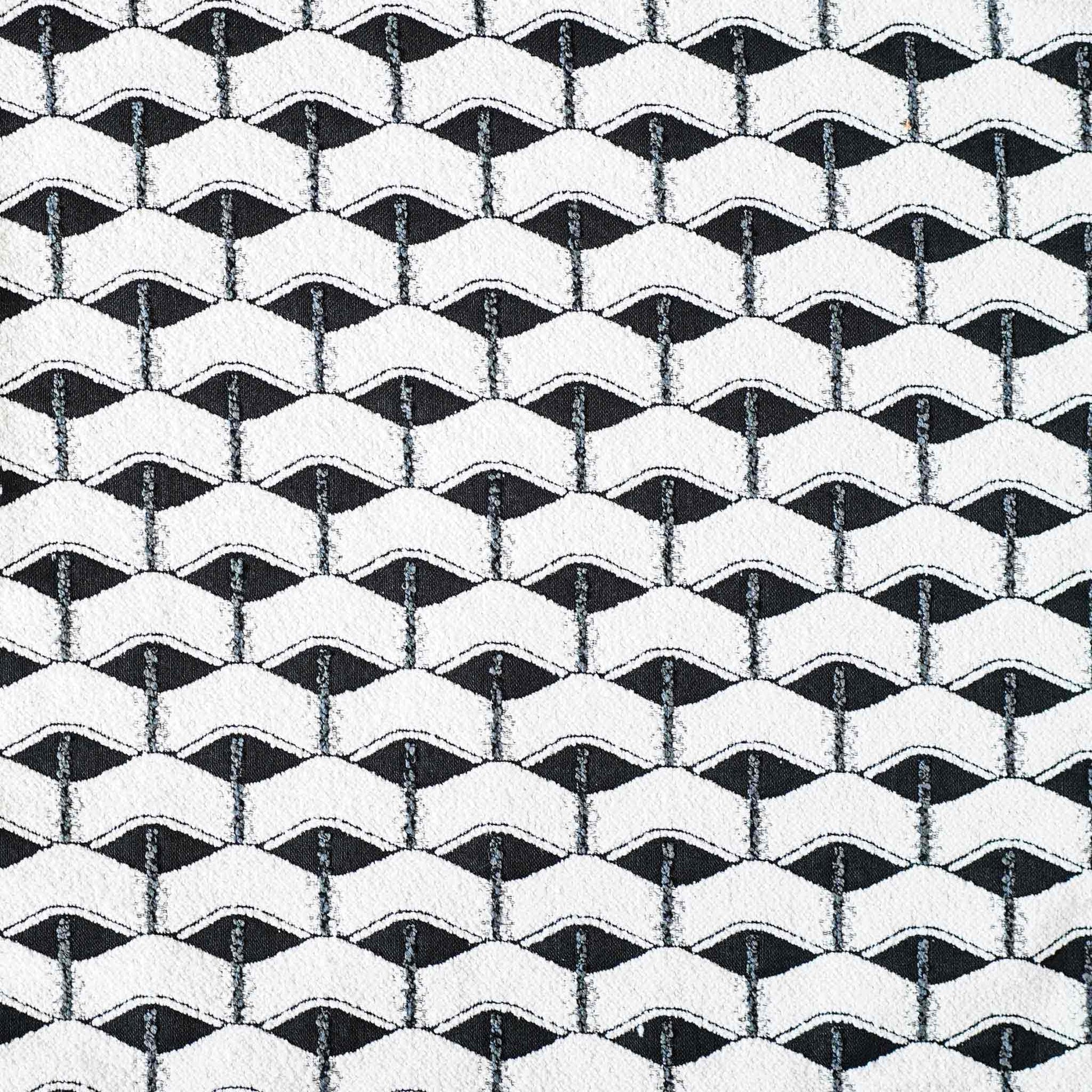 Chic black and white geometric cushion cover.