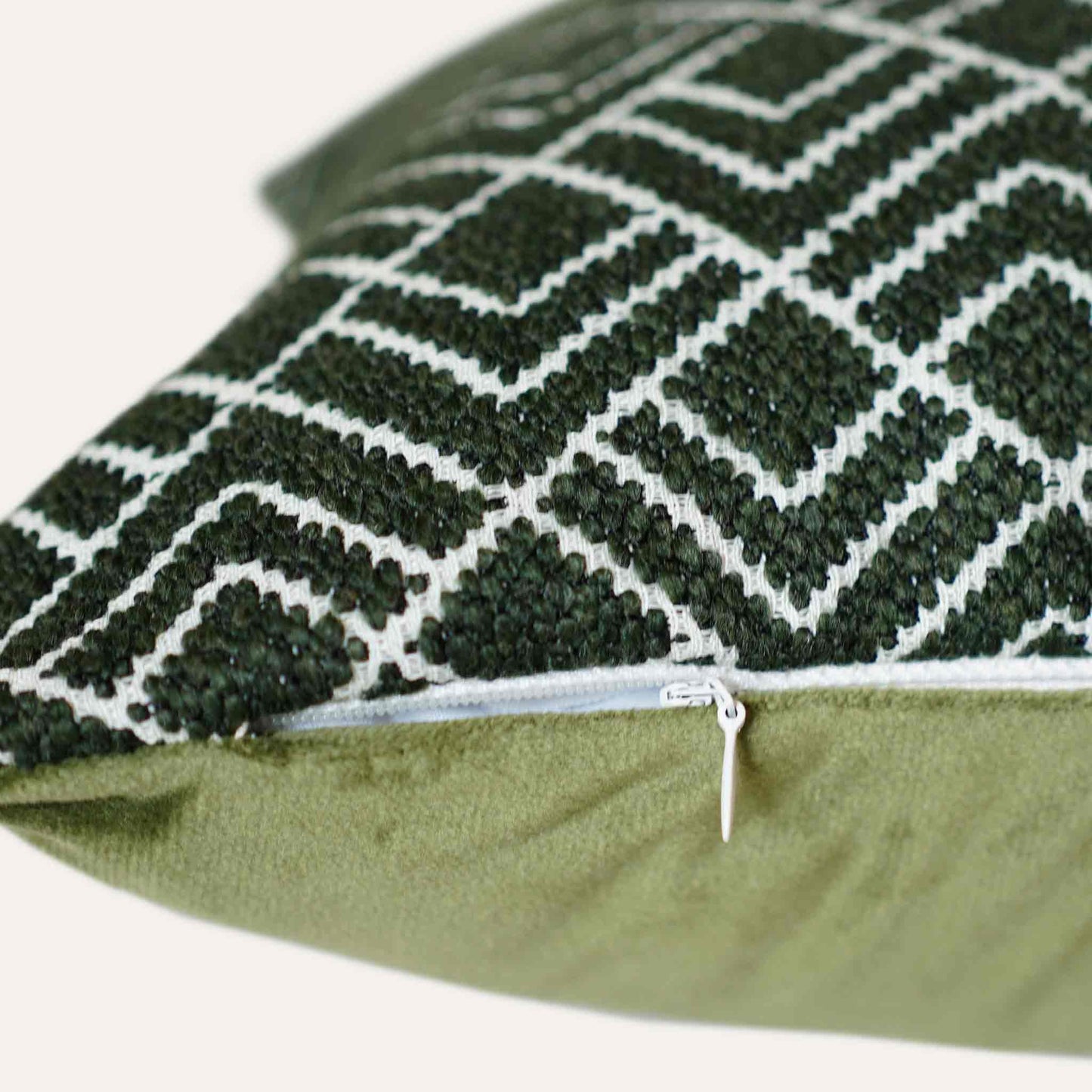 Stylish green and white geometric cushion cover with invisible zipper.