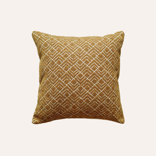 A vibrant yellow cushion cover with a modern geometric pattern, crafted from durable cut pile jacquard.