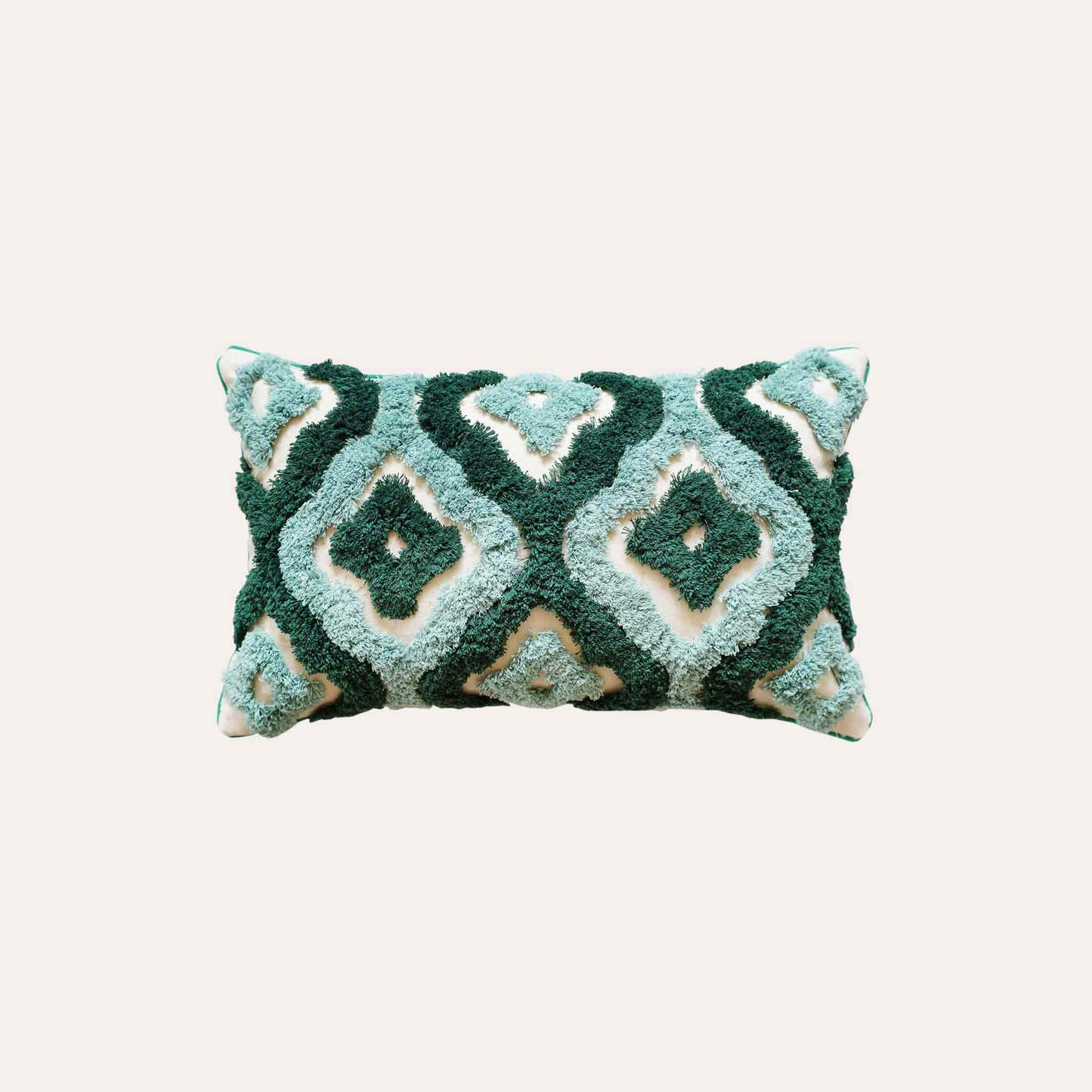 Two-tone turquoise tufted decorative lumbar cushion cover.