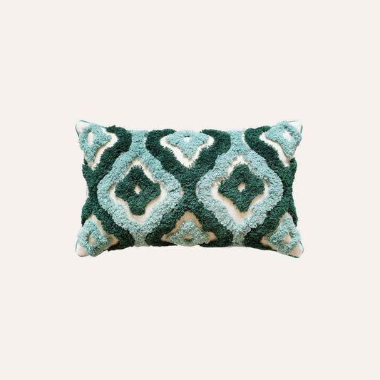 Two-tone turquoise tufted decorative lumbar cushion cover.