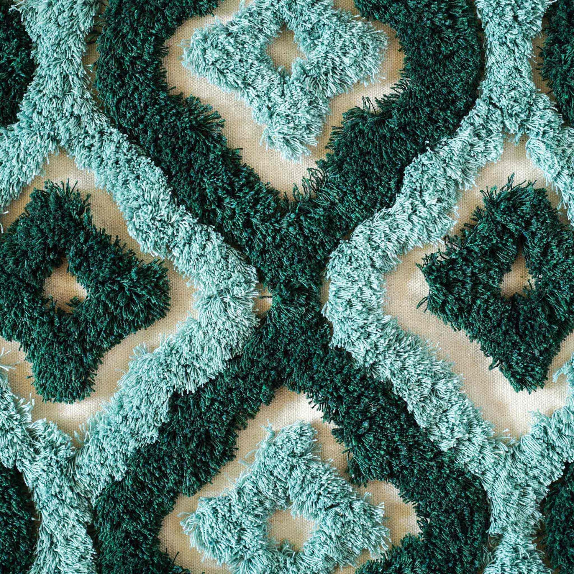 Two-tone turquoise tufted decorative lumbar cushion cover.