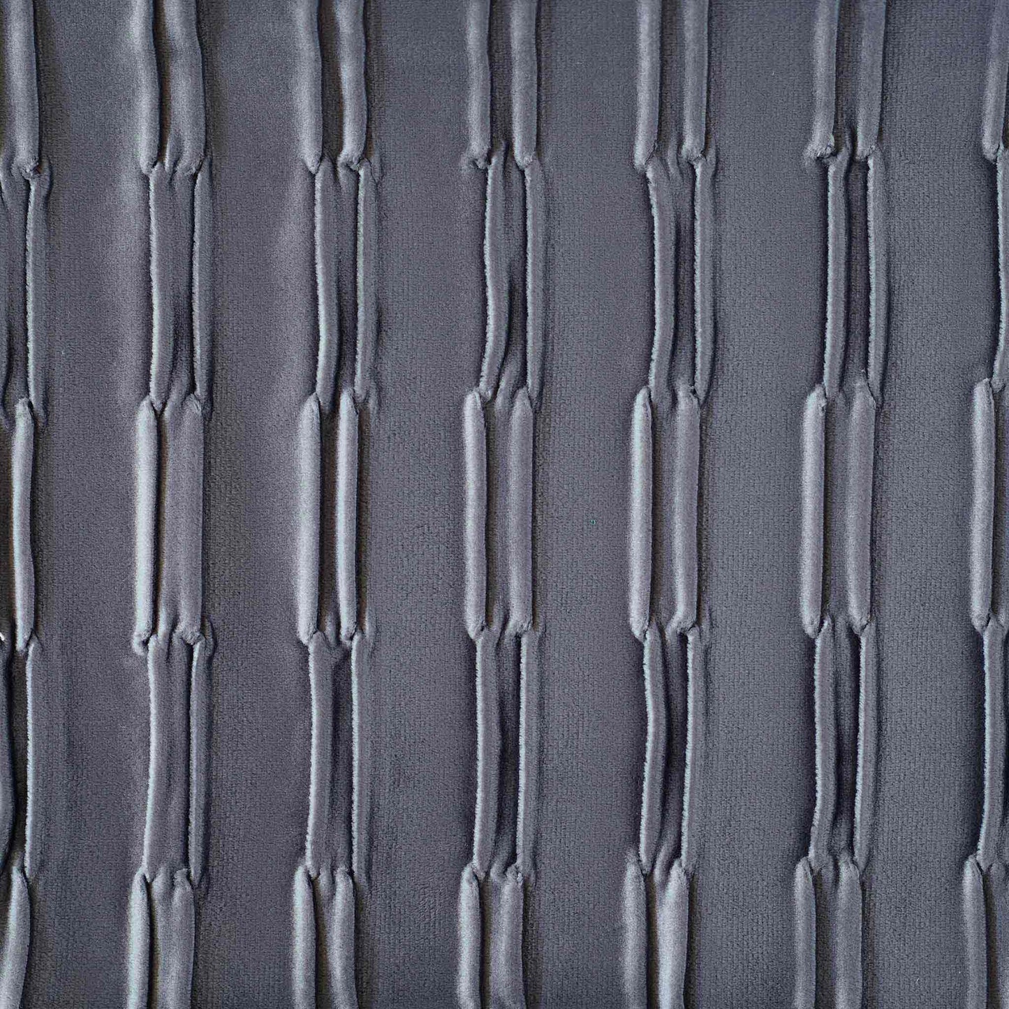 Dark grey pleated velvet lumbar cushion cover.