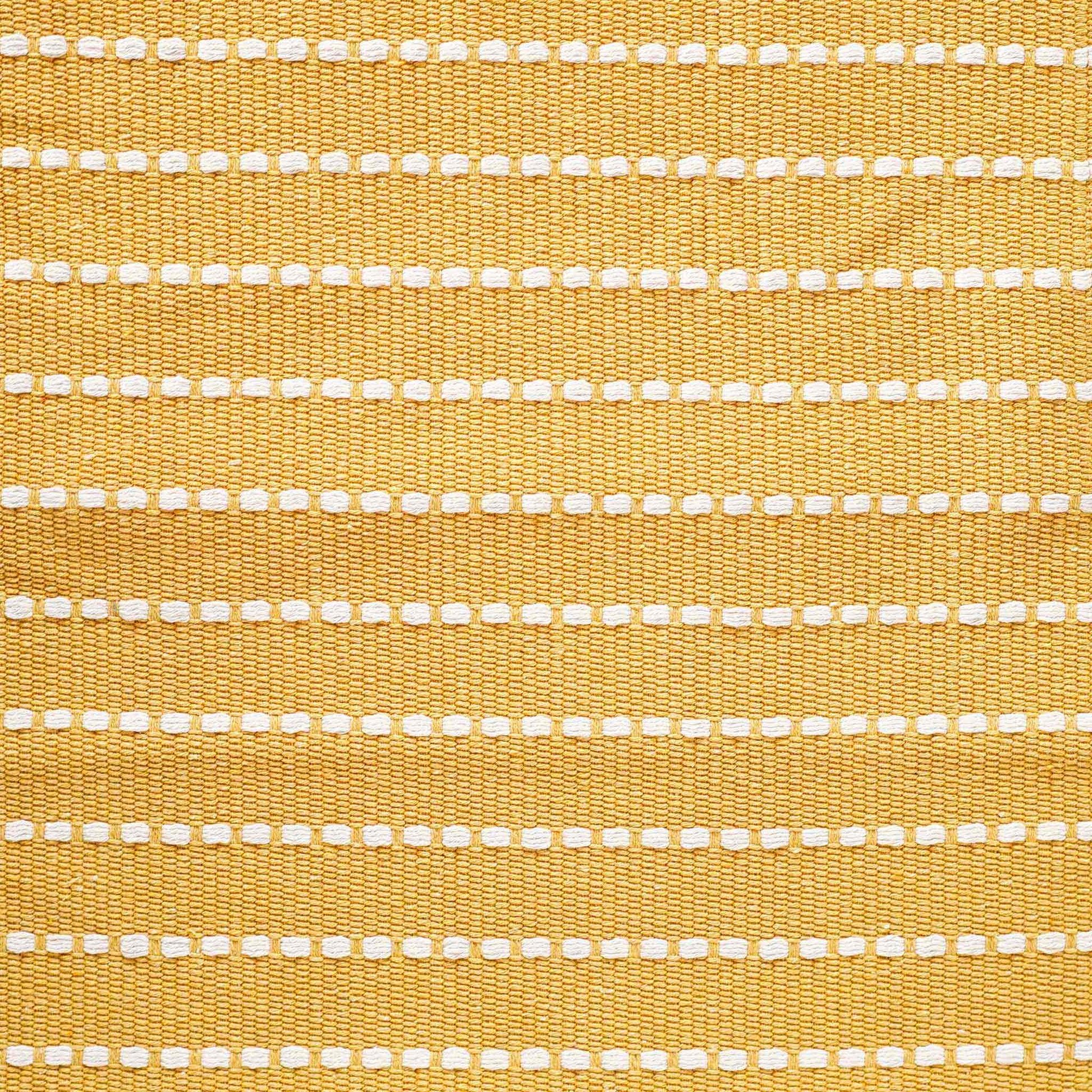 Stylish yellow woven square cushion covers with boho tassels.