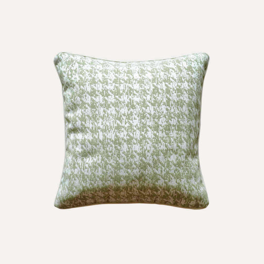 Decorative cushion cover featuring a green and white houndstooth pattern, crafted from soft chenille fabric.