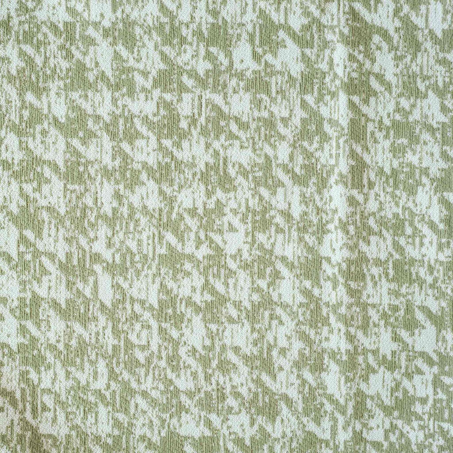 Decorative cushion cover featuring a green and white houndstooth pattern, crafted from soft chenille fabric.