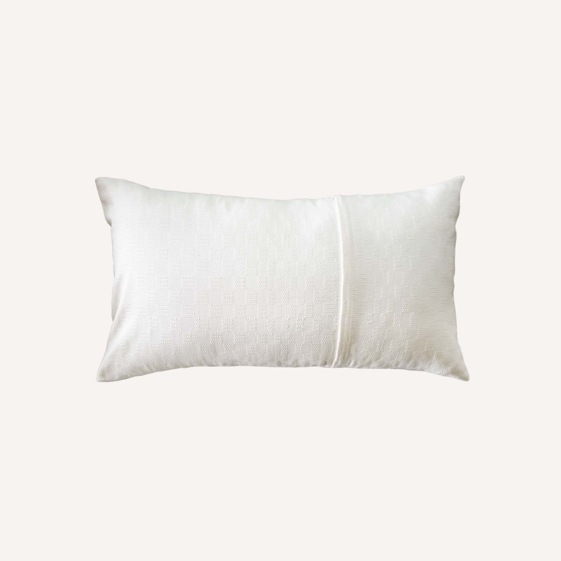 White textured lumbar cushion back.