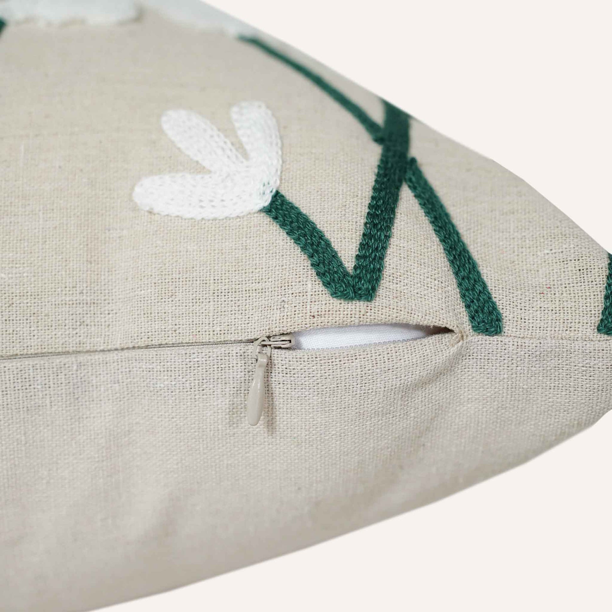 Close-up of the invisible zip on the large daisy beige base cushion.