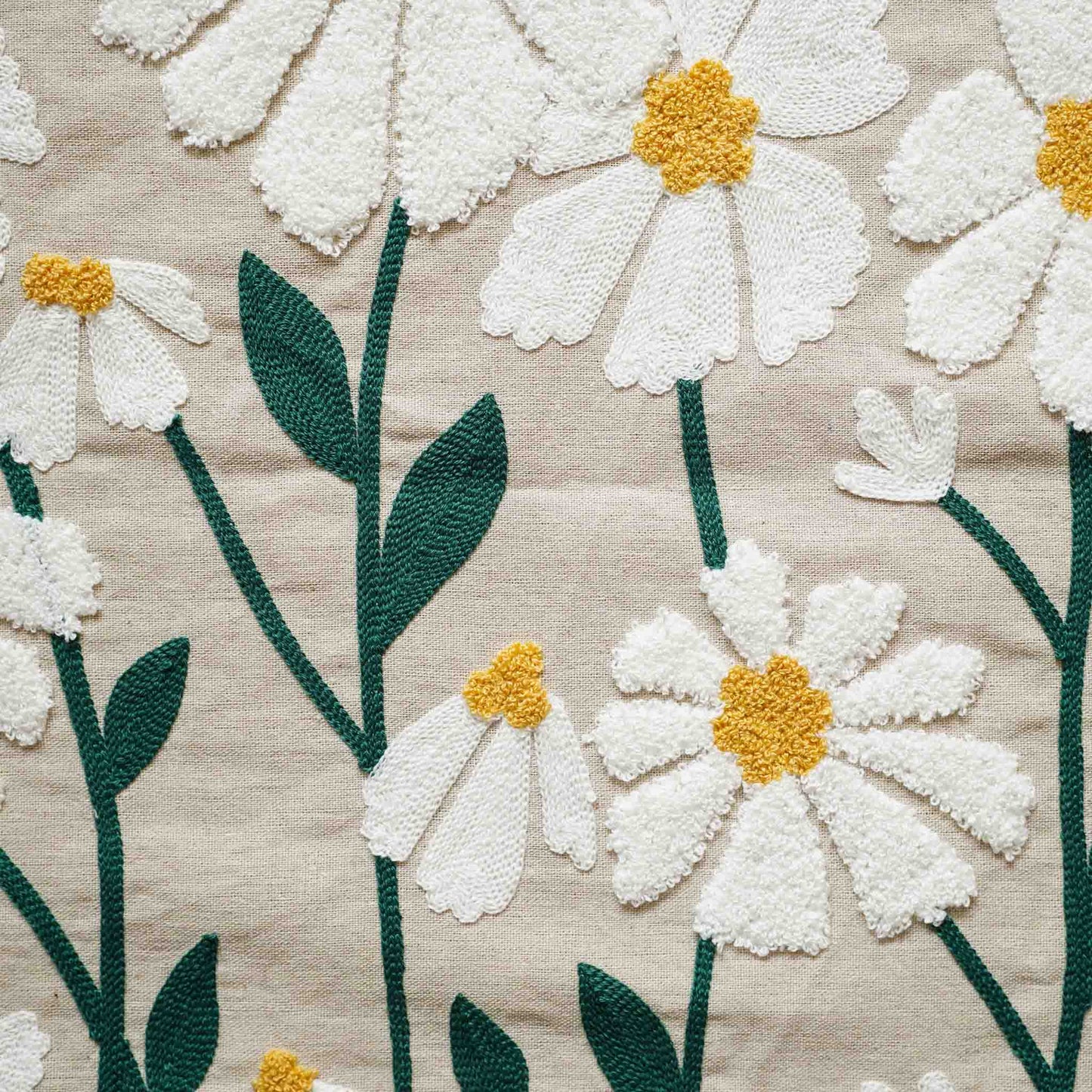 Large daisy tufted beige base cushion.