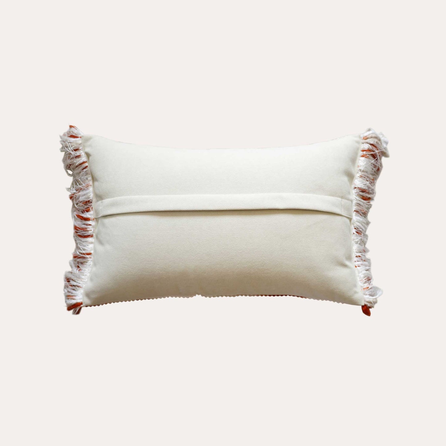 Ivory red mixed color woven fringe cushion cover with white back.