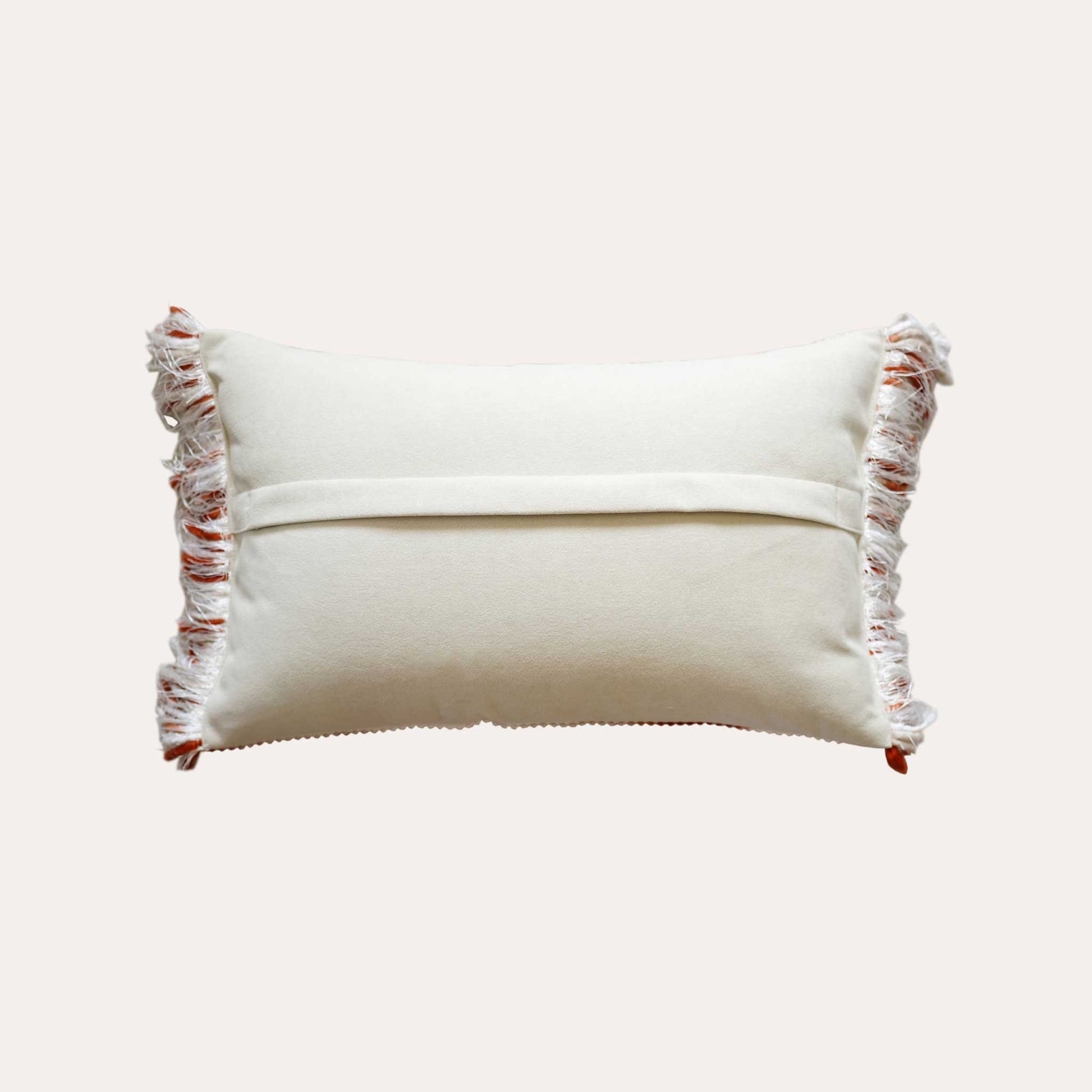 Ivory red mixed color woven fringe cushion cover with white back.