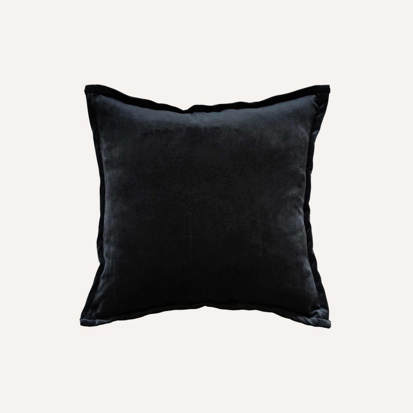 Black and white abstract shadow pattern cushion cover with black back.