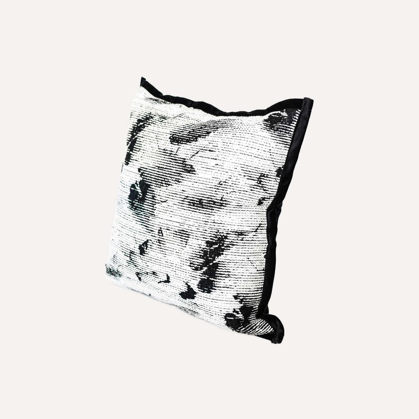 Black and white abstract shadow pattern cushion cover.