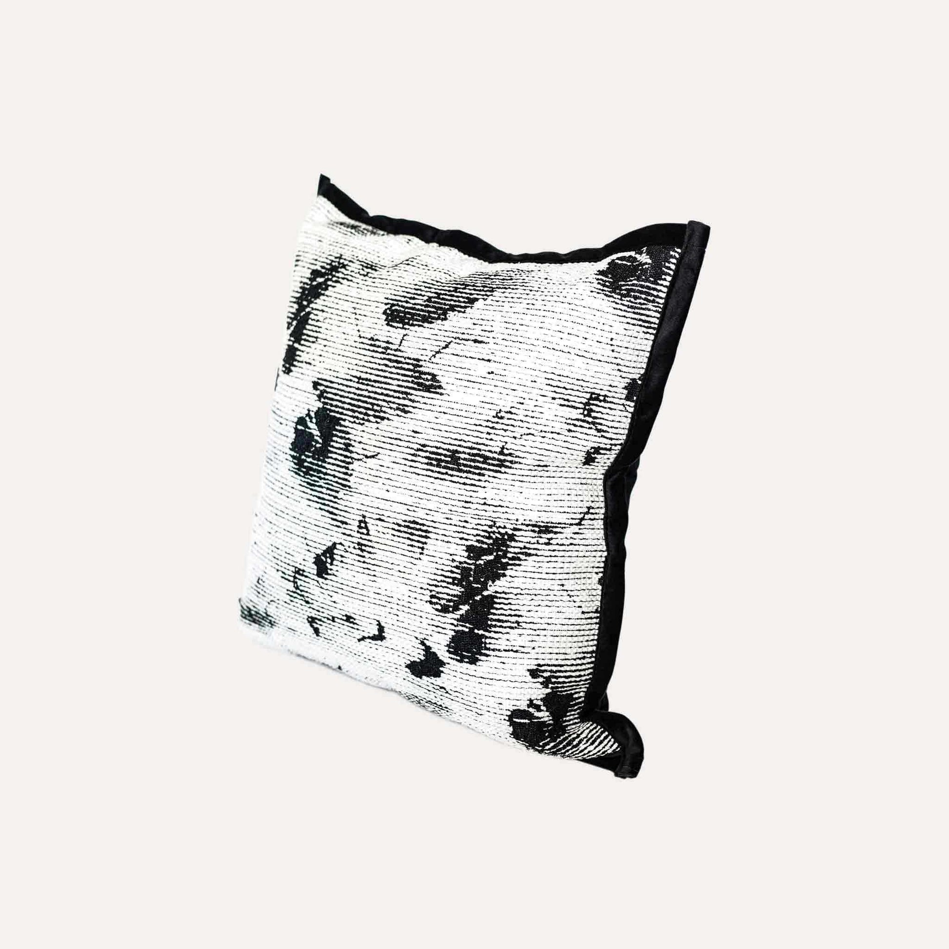 Black and white abstract shadow pattern cushion cover.