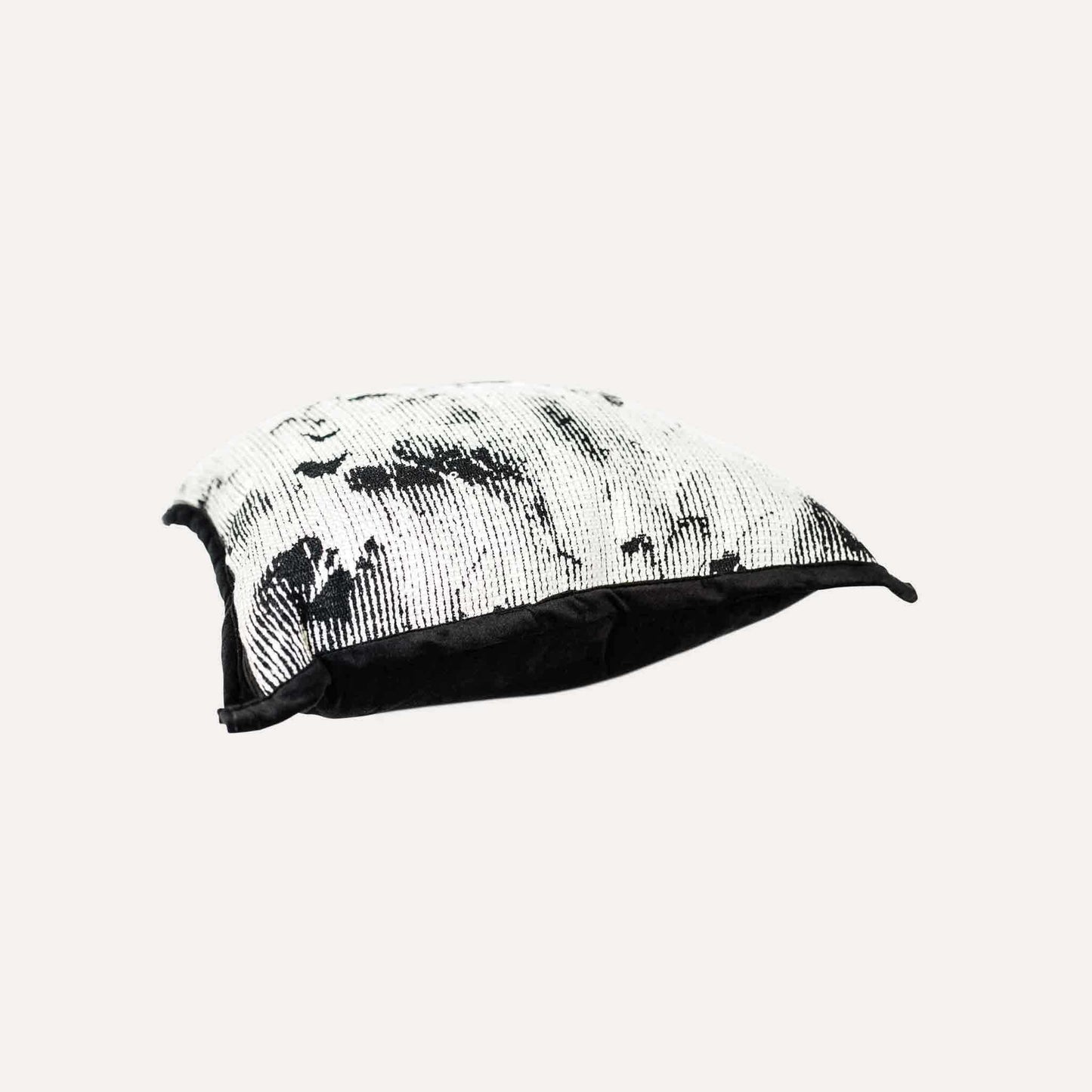 Black and white abstract shadow pattern cushion cover.