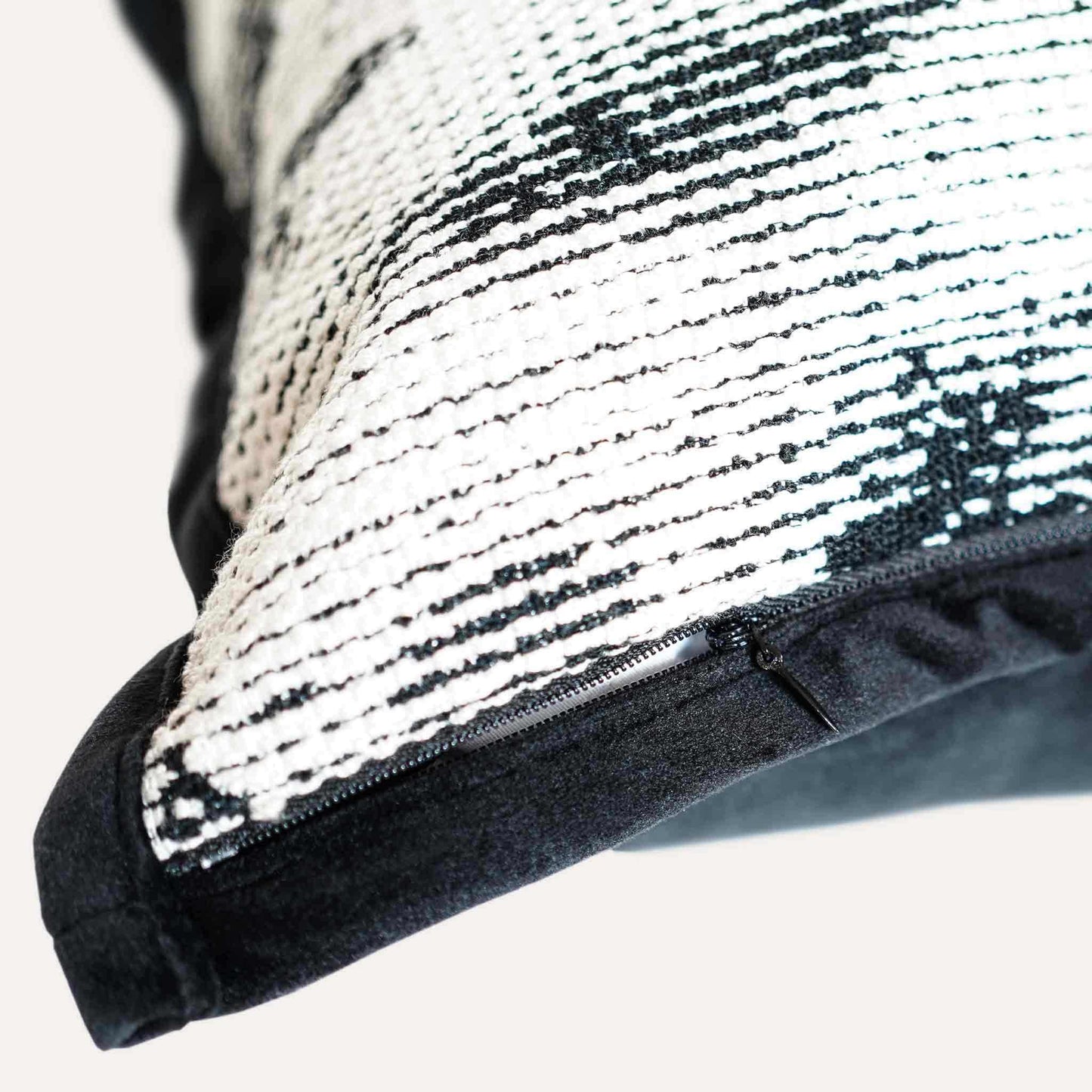 Black and white abstract shadow pattern cushion cover with invisible zipper.