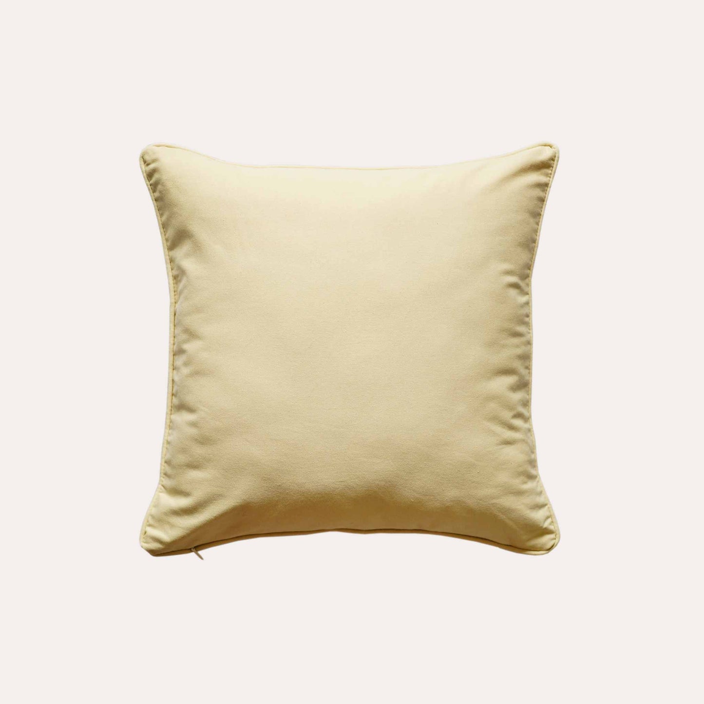 Beautiful beige and yellow floral cushion covers with yellow back.