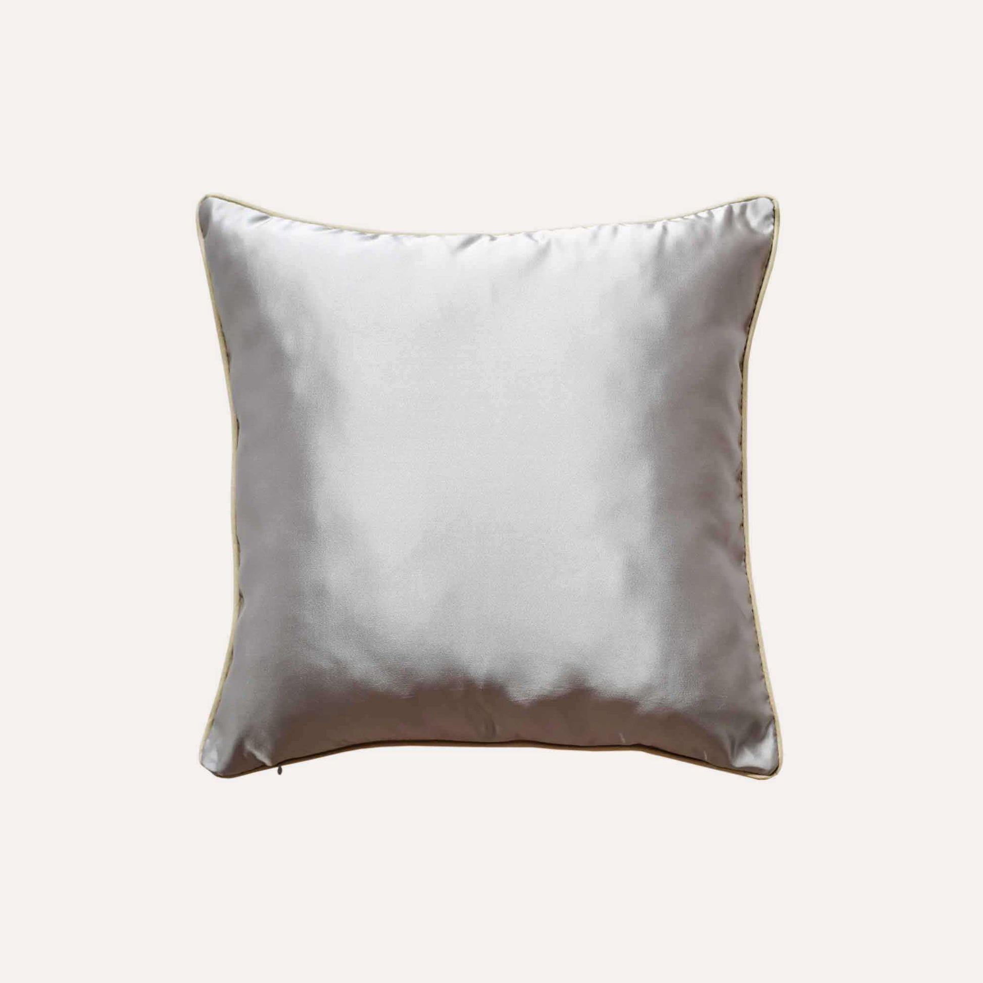 A luxurious silver and grey abstract jacquard cushion cover with silver back. 
