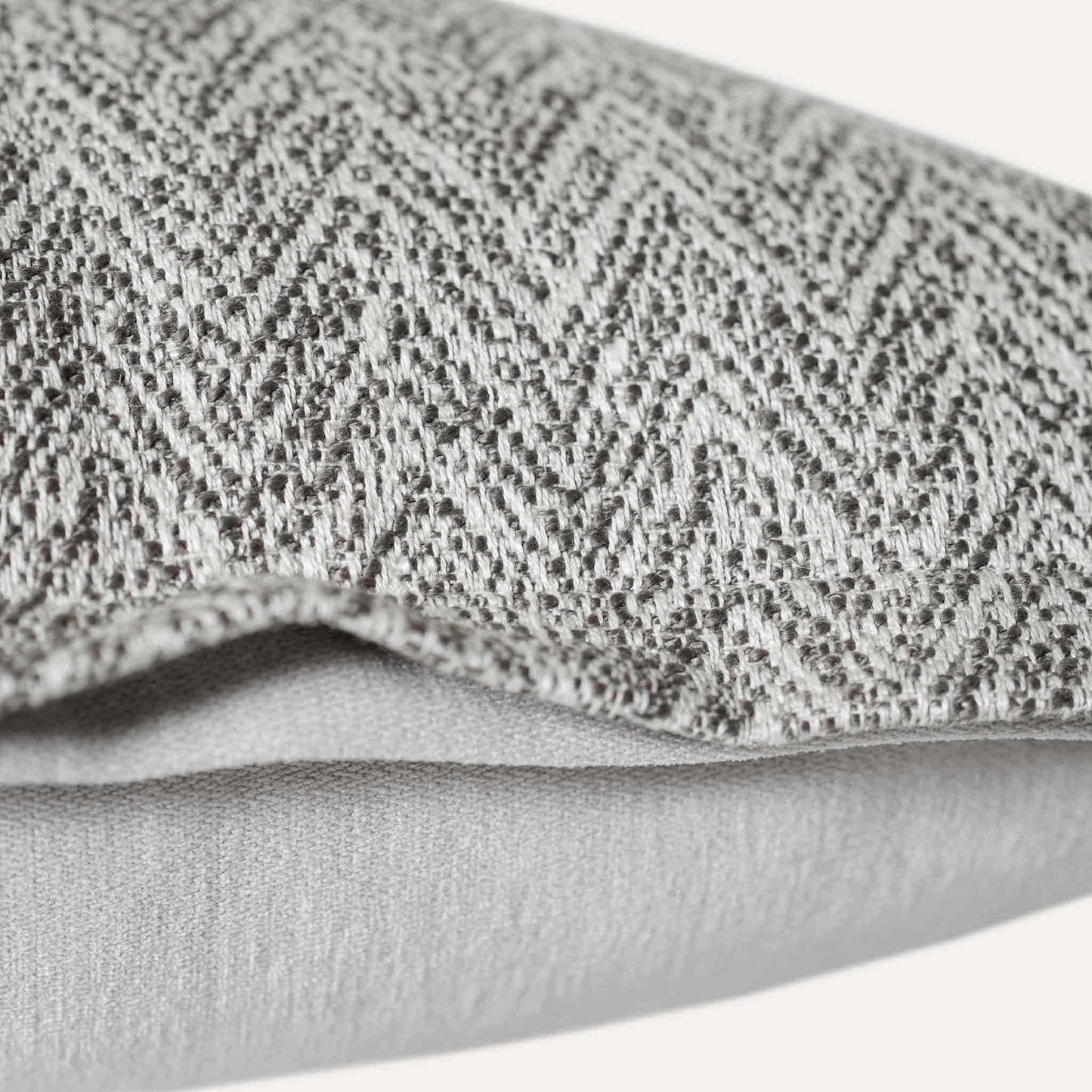 Elegant herringbone linen-cotton broadside cushion cover in a sophisticated off-white design.
