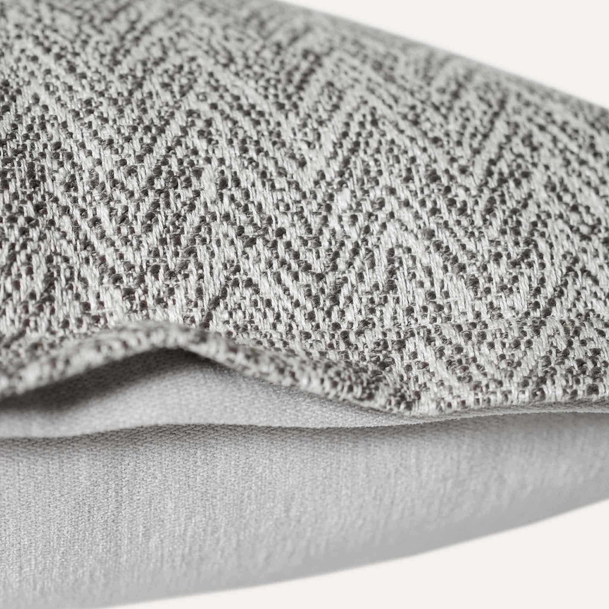 Elegant herringbone linen-cotton broadside cushion cover in a sophisticated off-white design.