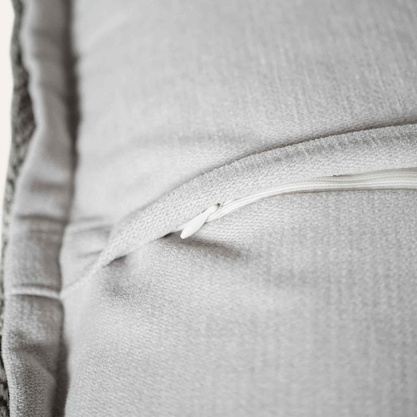Elegant herringbone linen-cotton broadside cushion cover in a sophisticated off-white design with invisible zipper.