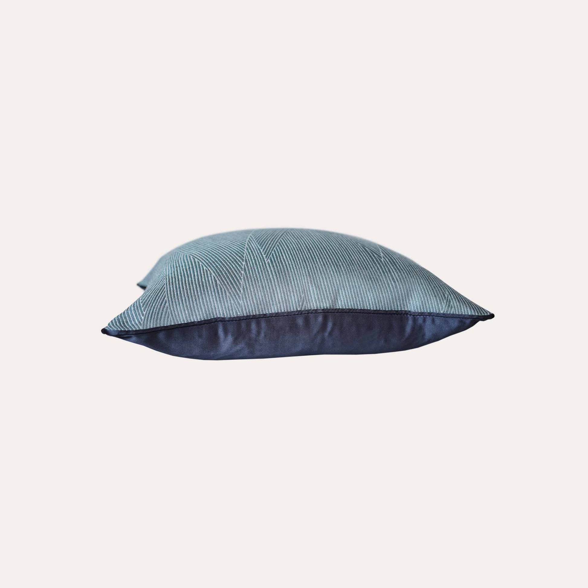 Luxurious blue grey cushion cover with chic striped design.