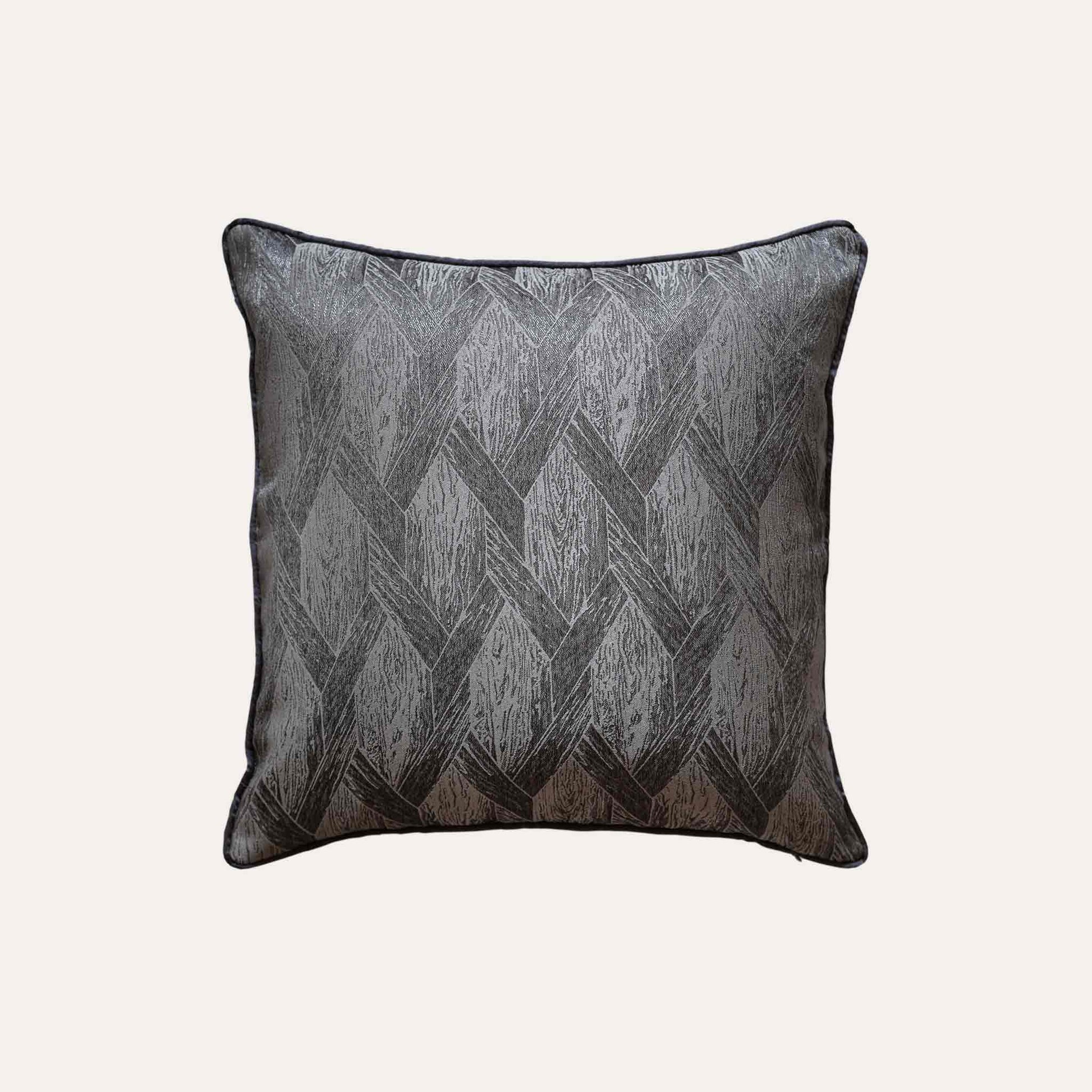 Elegant gray and black cushions featuring stylish geometric designs.