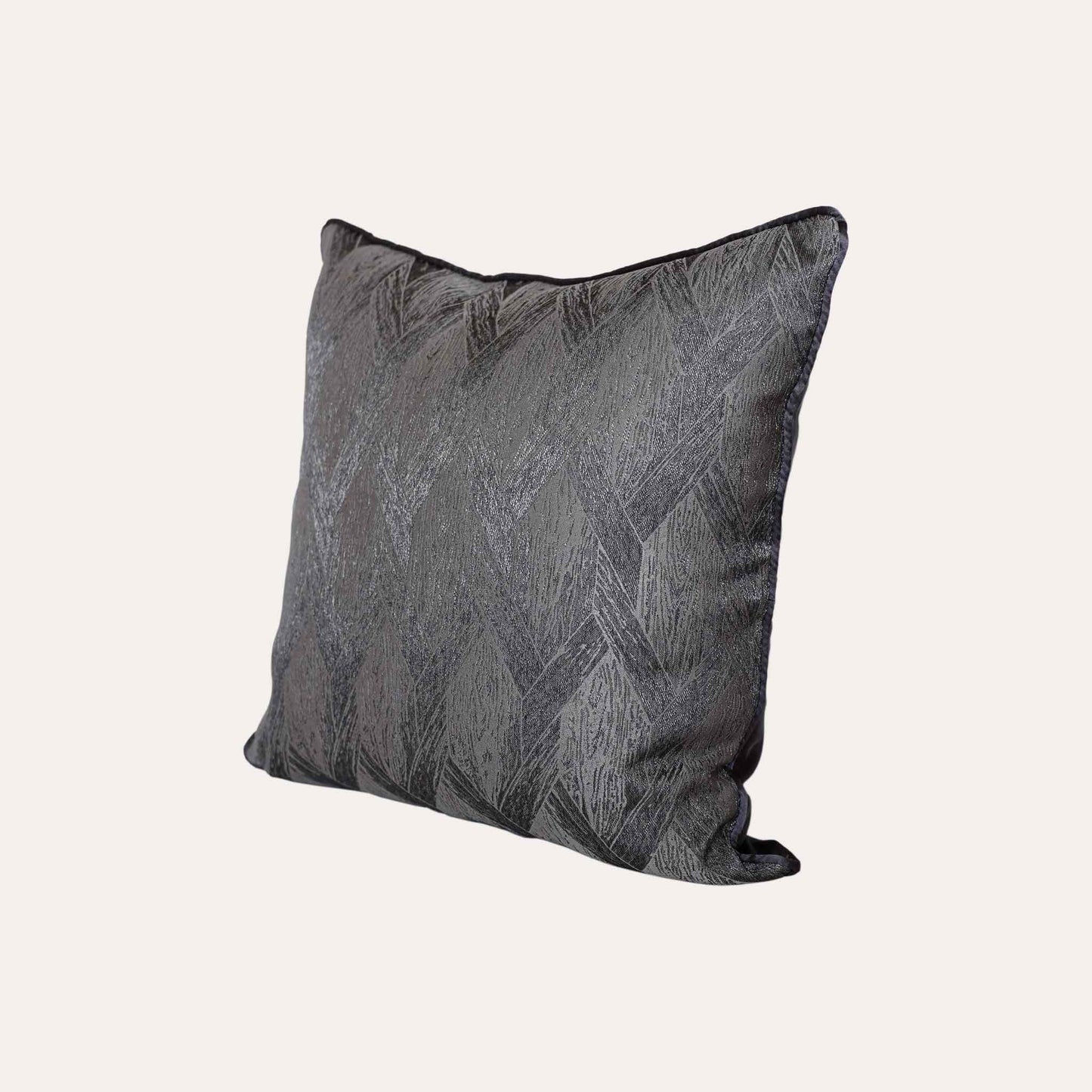 Elegant gray and black cushions featuring stylish geometric designs.