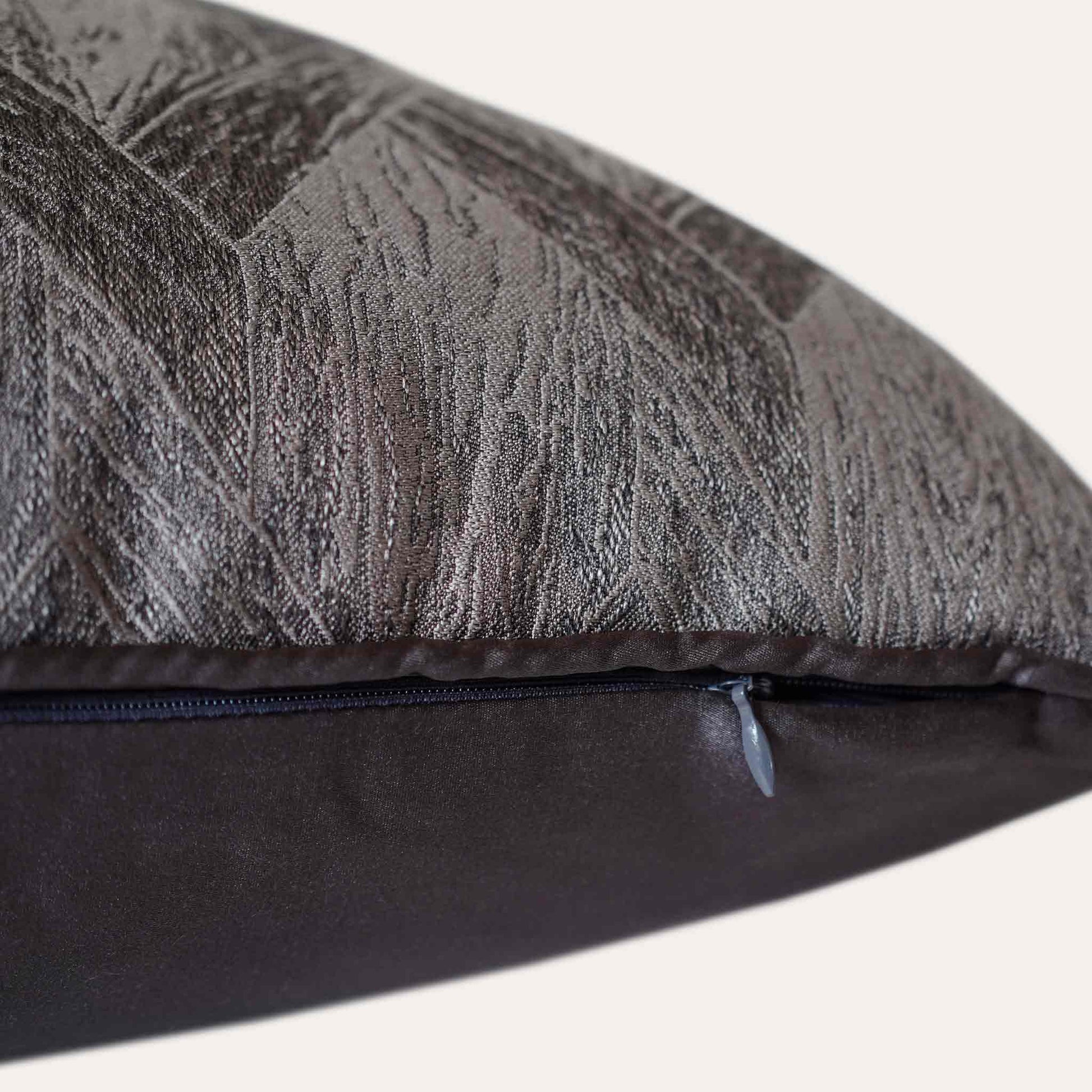 Elegant gray and black cushions featuring stylish geometric designs with invisible zipper.