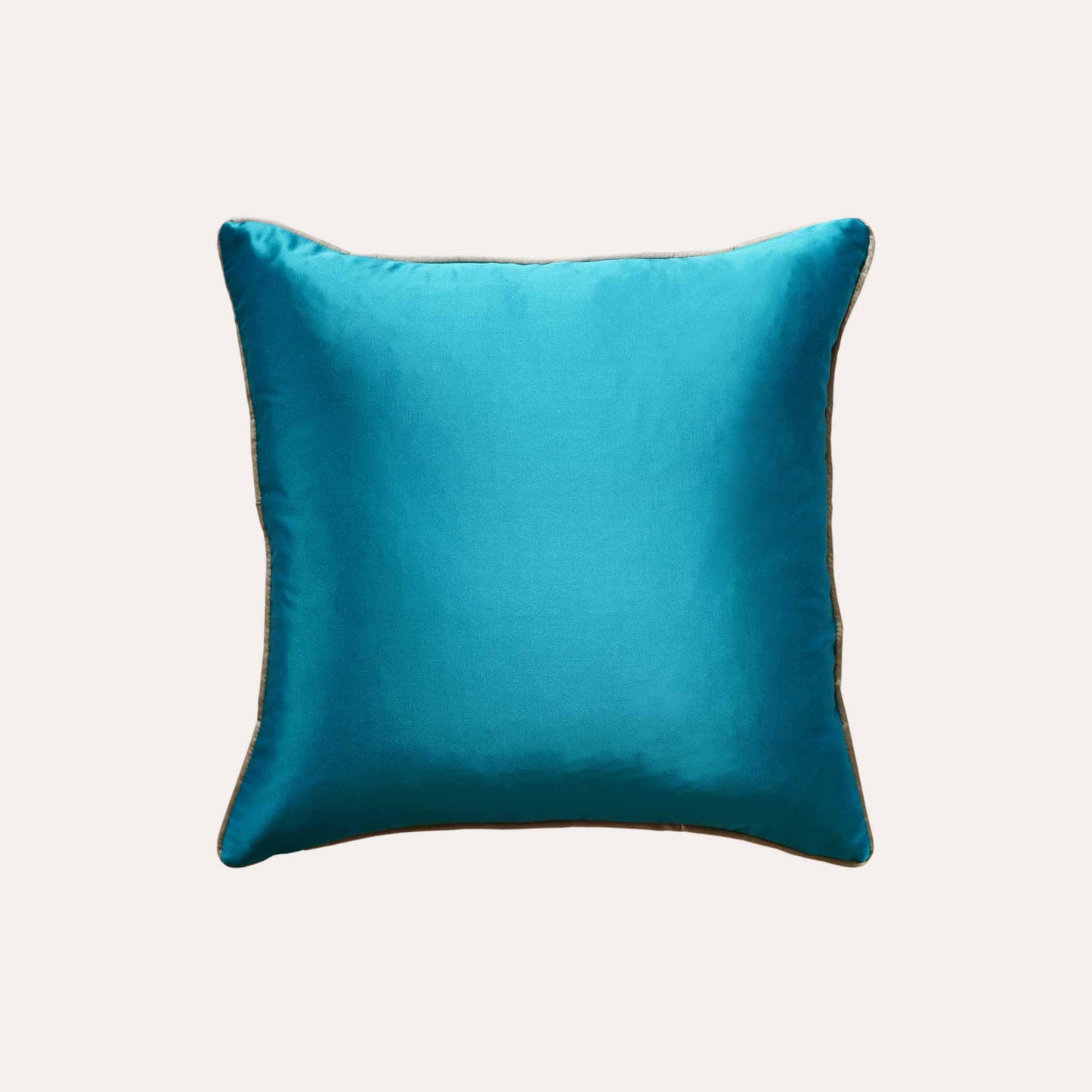 Elegant light blue background cushion cover with luxury gold rope jacquard design with blue back.