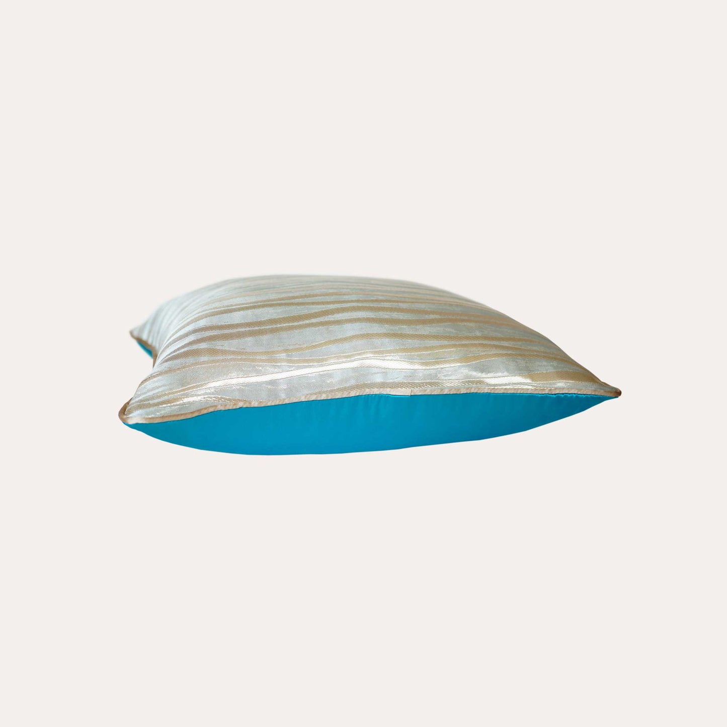 Elegant light blue background cushion cover with luxury gold rope jacquard design.