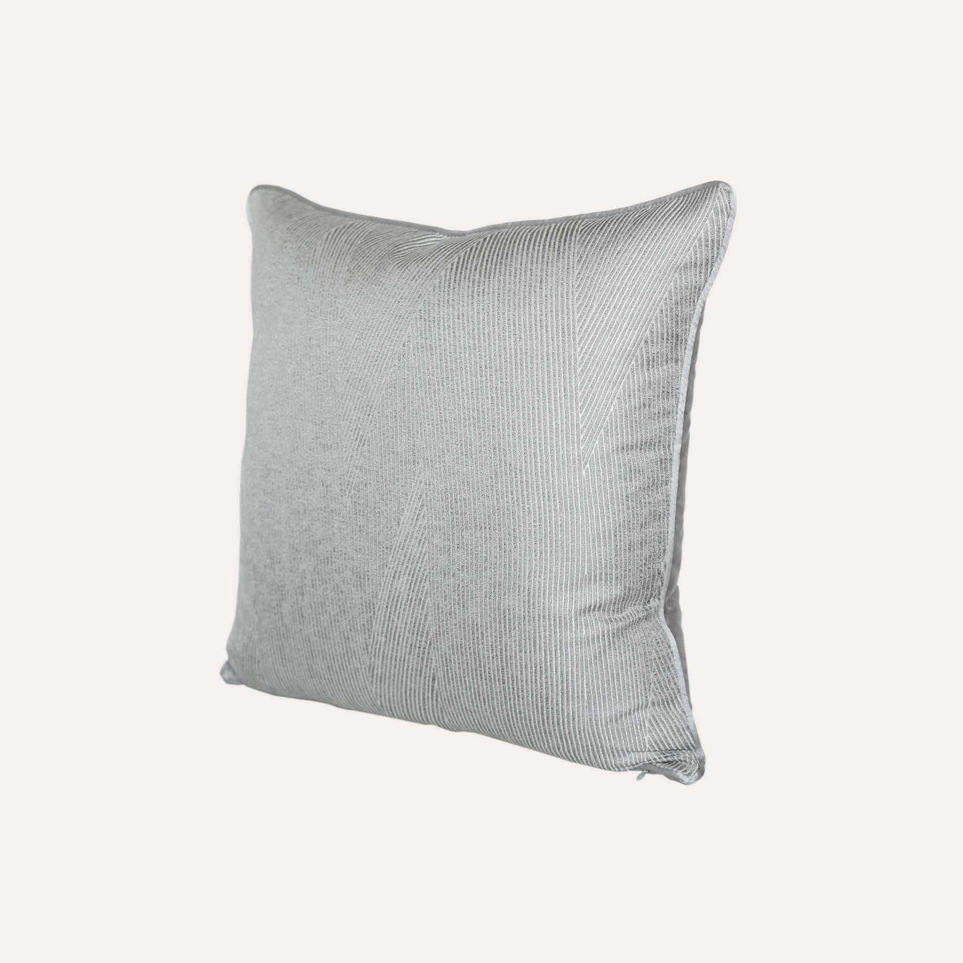 Luxurious silver gray cushion cover with chic striped design.