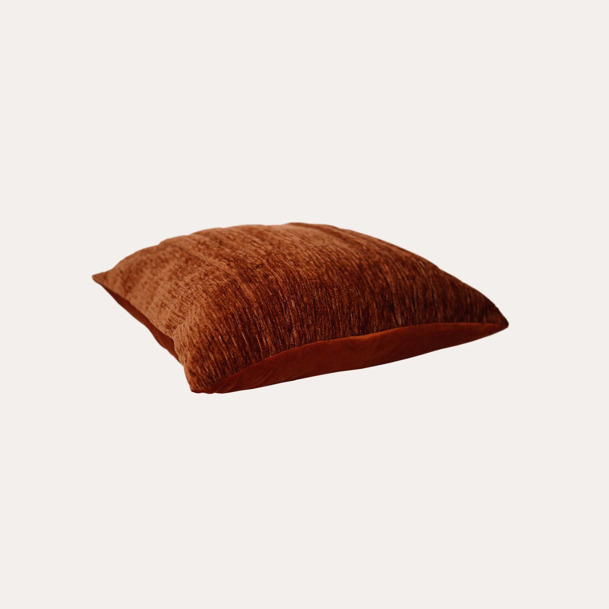 Soft, rust-toned cotton blend fabric features a three-dimensional pleated design.