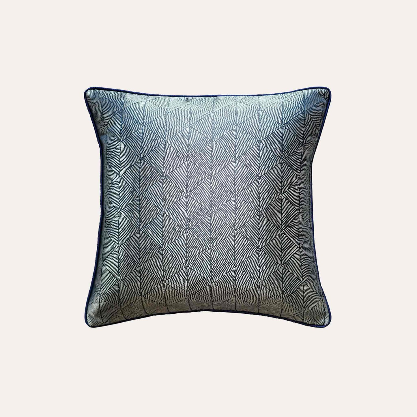 Luxurious silver blue accent cushion cover in a striking geometric triangle pattern.