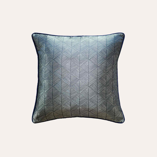 Luxurious silver blue accent cushion cover in a striking geometric triangle pattern.