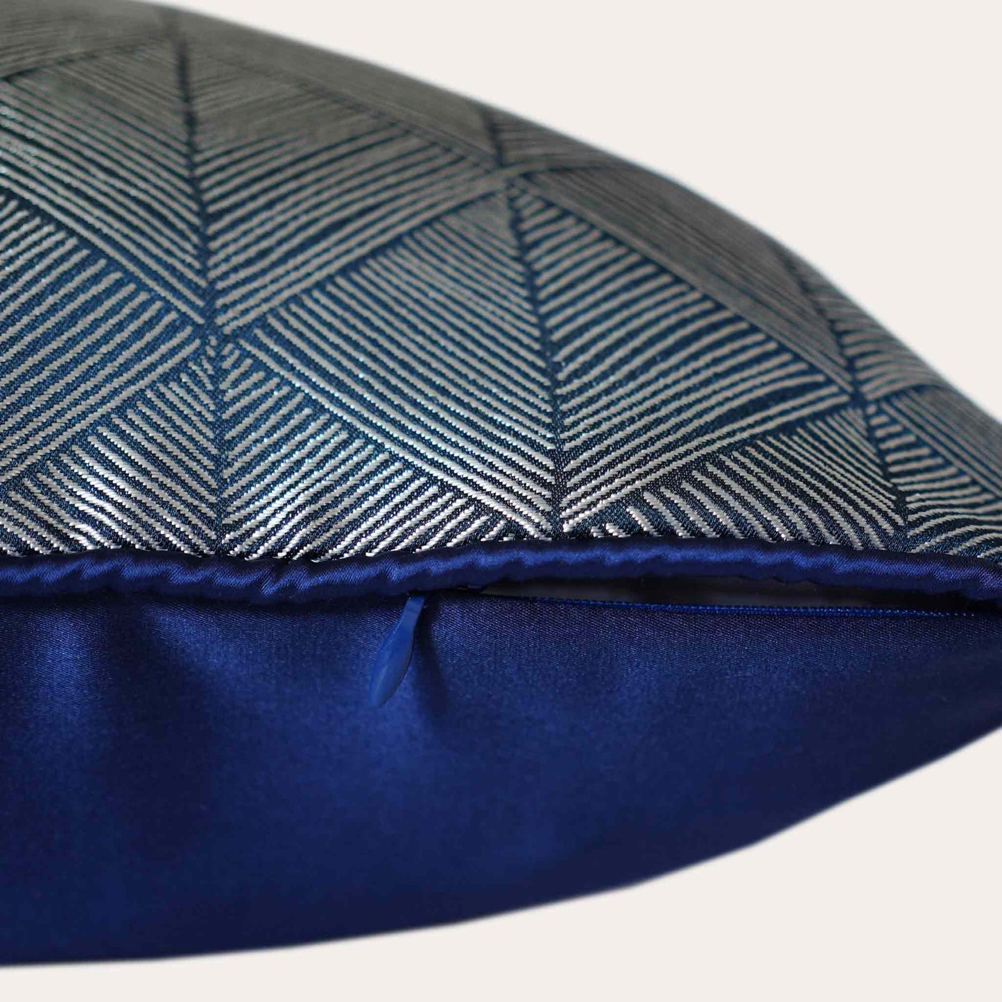 Luxurious silver blue accent cushion cover in a striking geometric triangle pattern with invisible zipper.