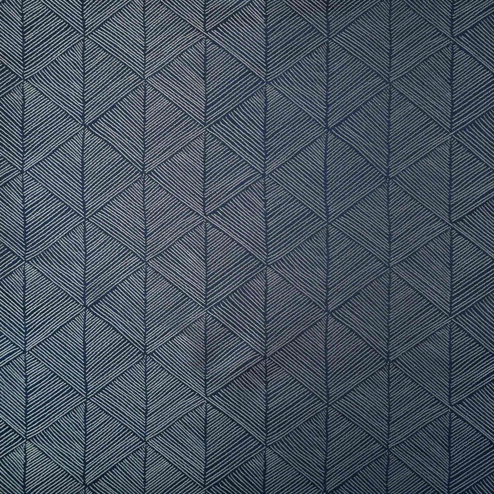 Luxurious silver blue accent cushion cover in a striking geometric triangle pattern.