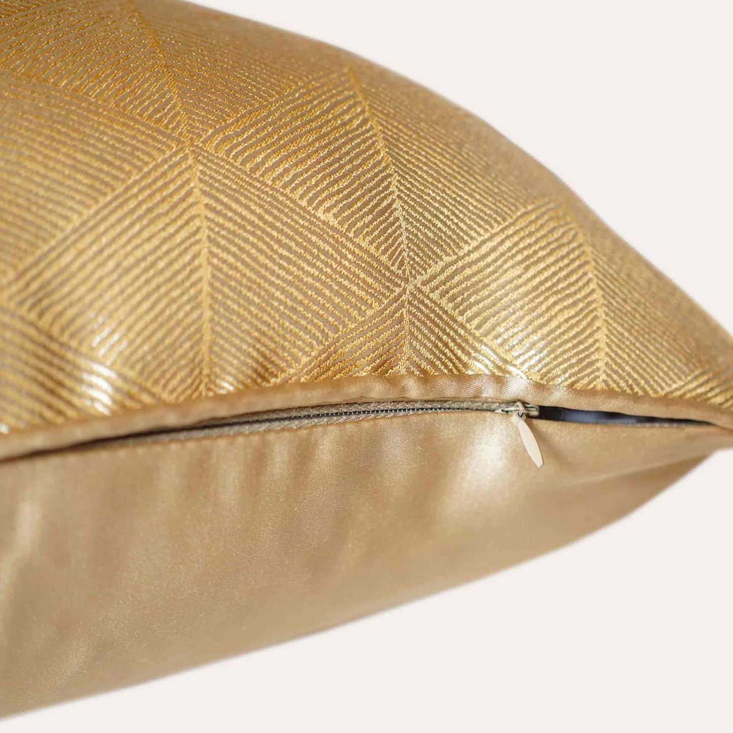 Luxurious gold accent cushion cover in a striking geometric triangle pattern with invisible zipper.