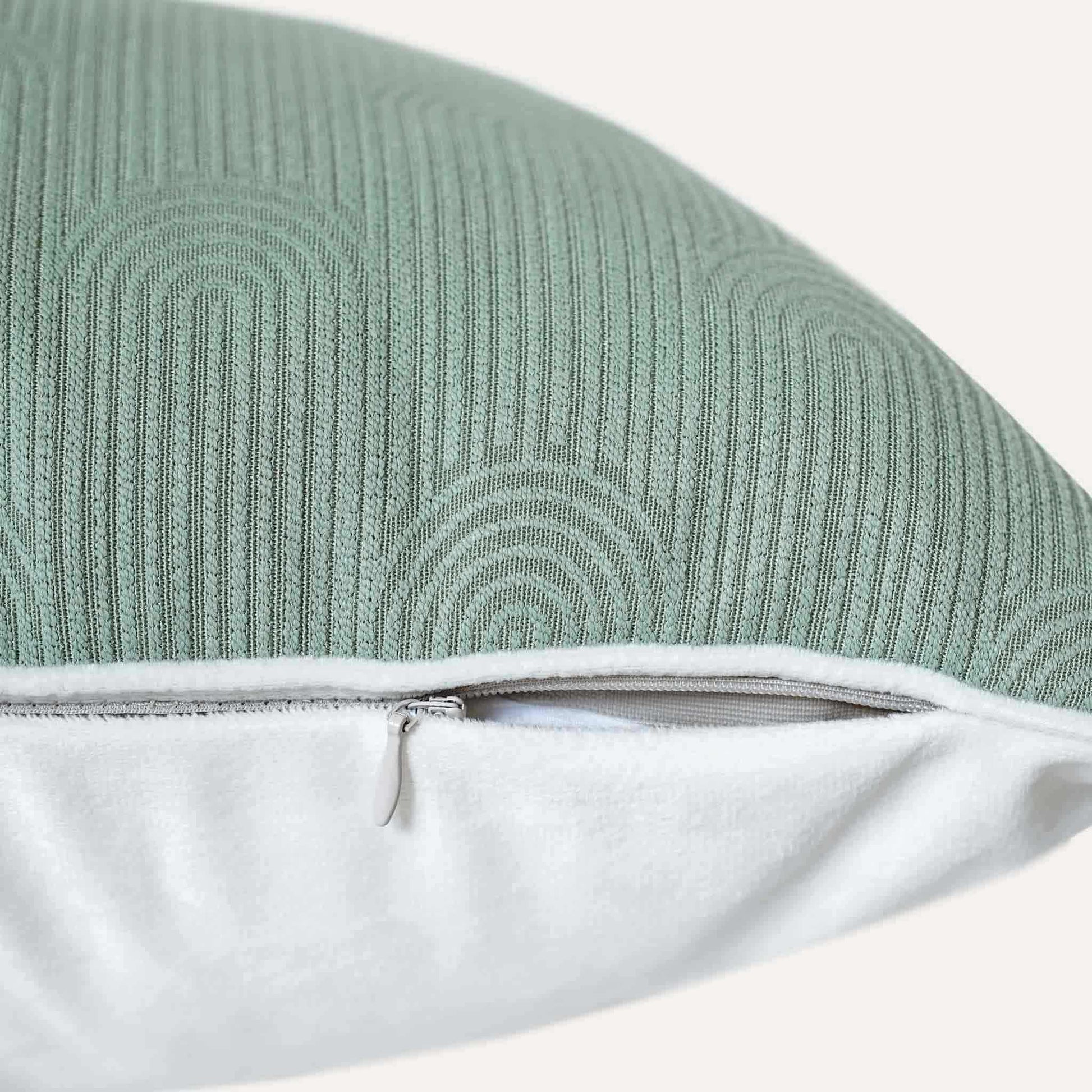 Semi-curved texture and white wrapped on mint green cushion cover with invisible zipper.