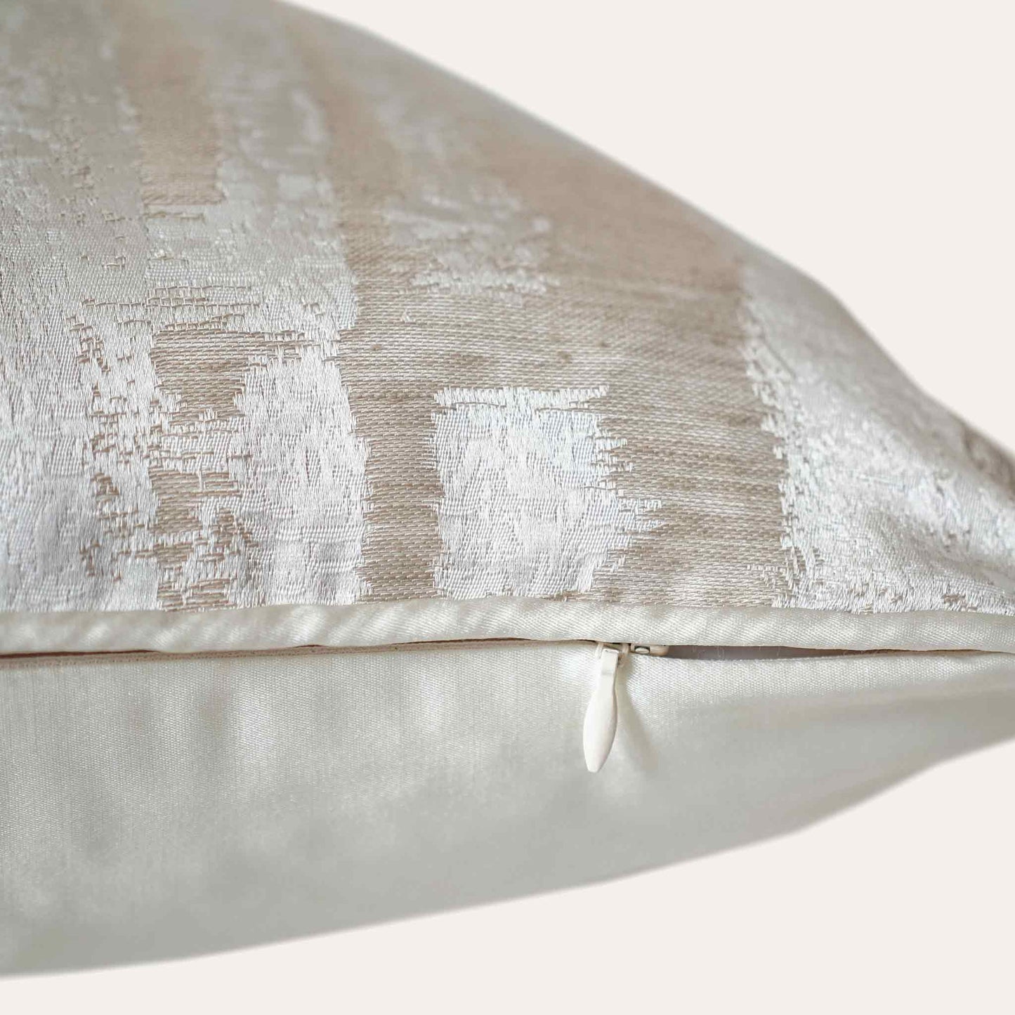 Modern silver and beige abstract pattern cushion cover with invisible zipper.