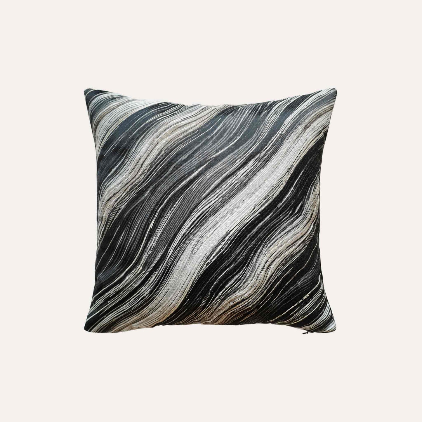 Black and gold abstract wave pattern cushion cover.