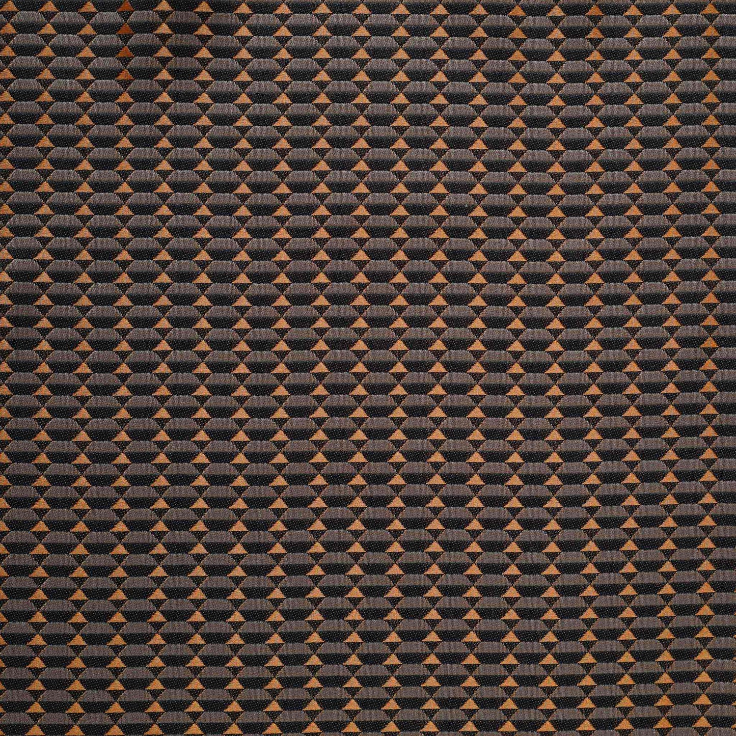 Contemporary cushion covers with a bold black and orange 3D geometric design