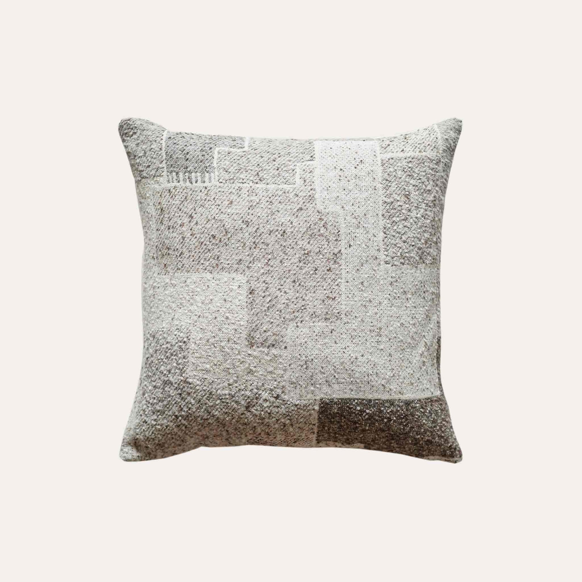 Chic neutral khaki geometric cushion covers.