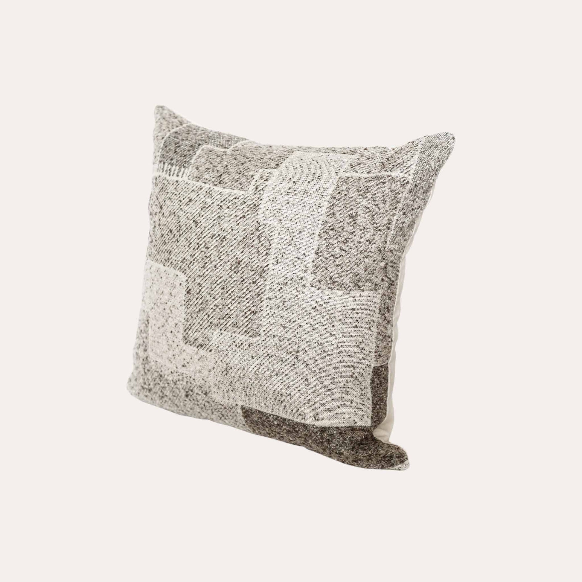Chic neutral khaki geometric cushion covers.