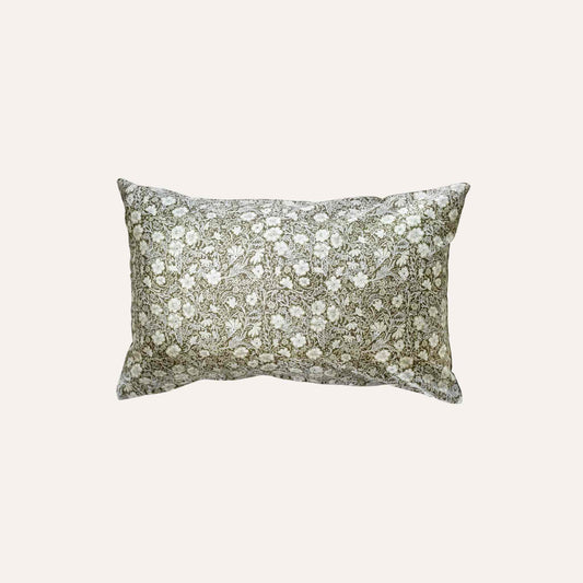 Floral pattern olive base lumbar cushion.