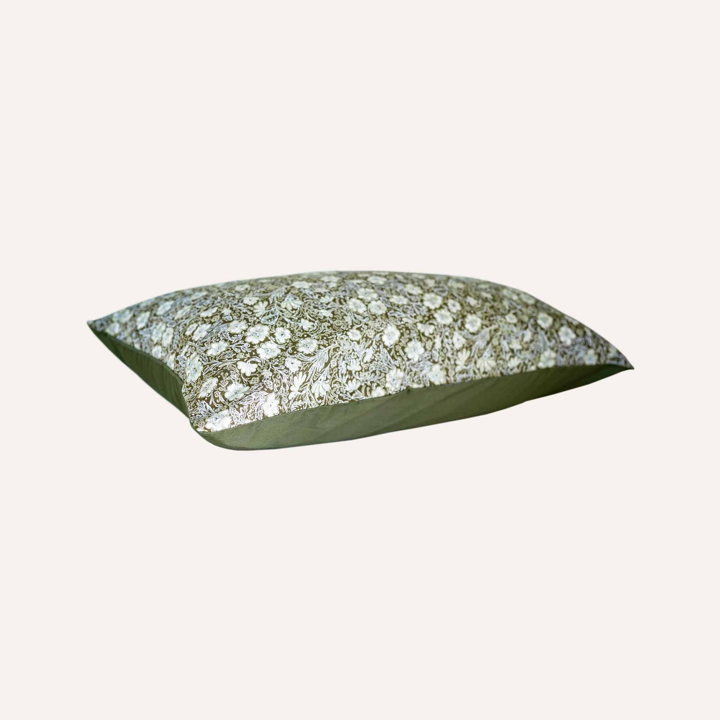 Floral pattern olive base lumbar cushion.