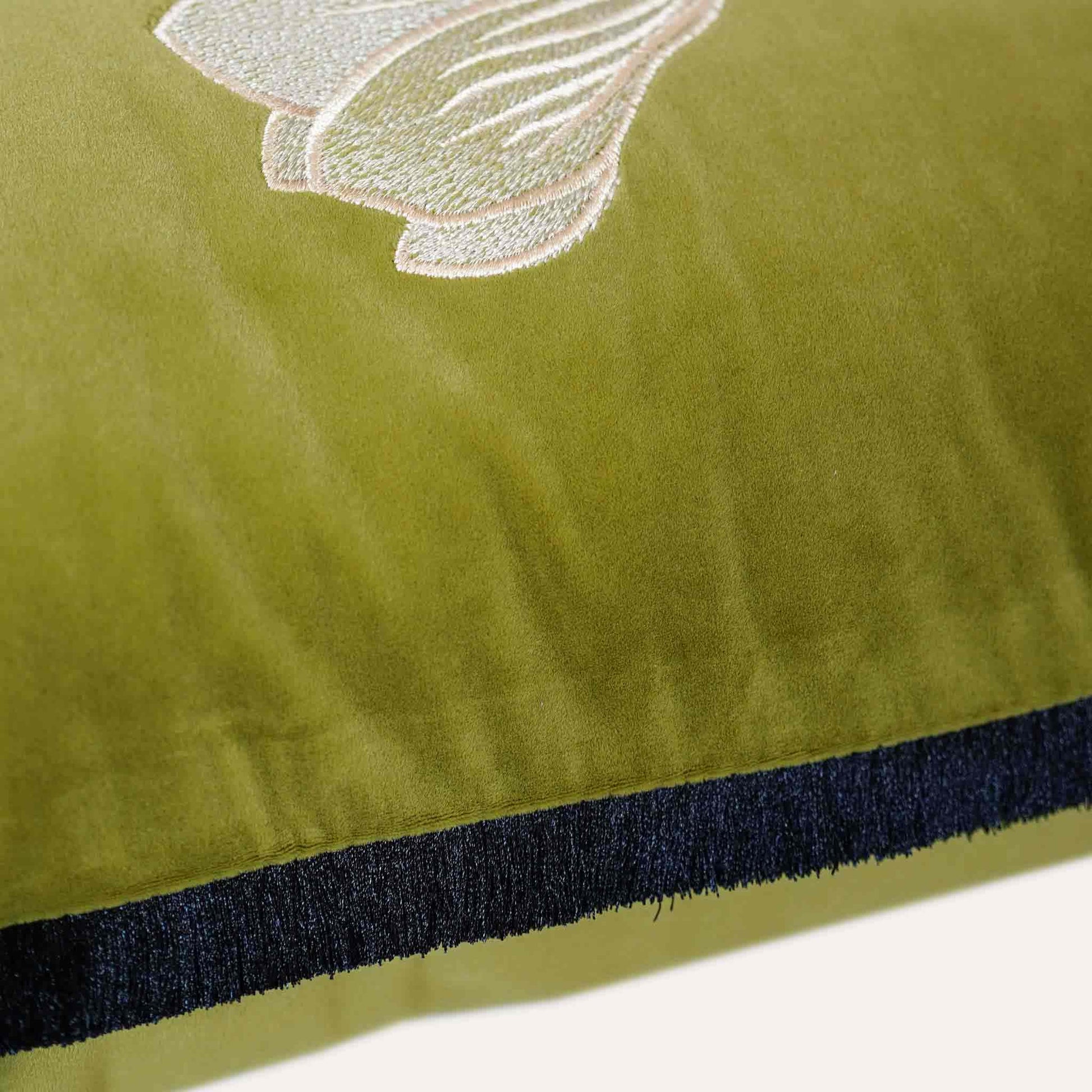 Oriental floral embroidery, black burlap with yellow-green velvet cushion cover.