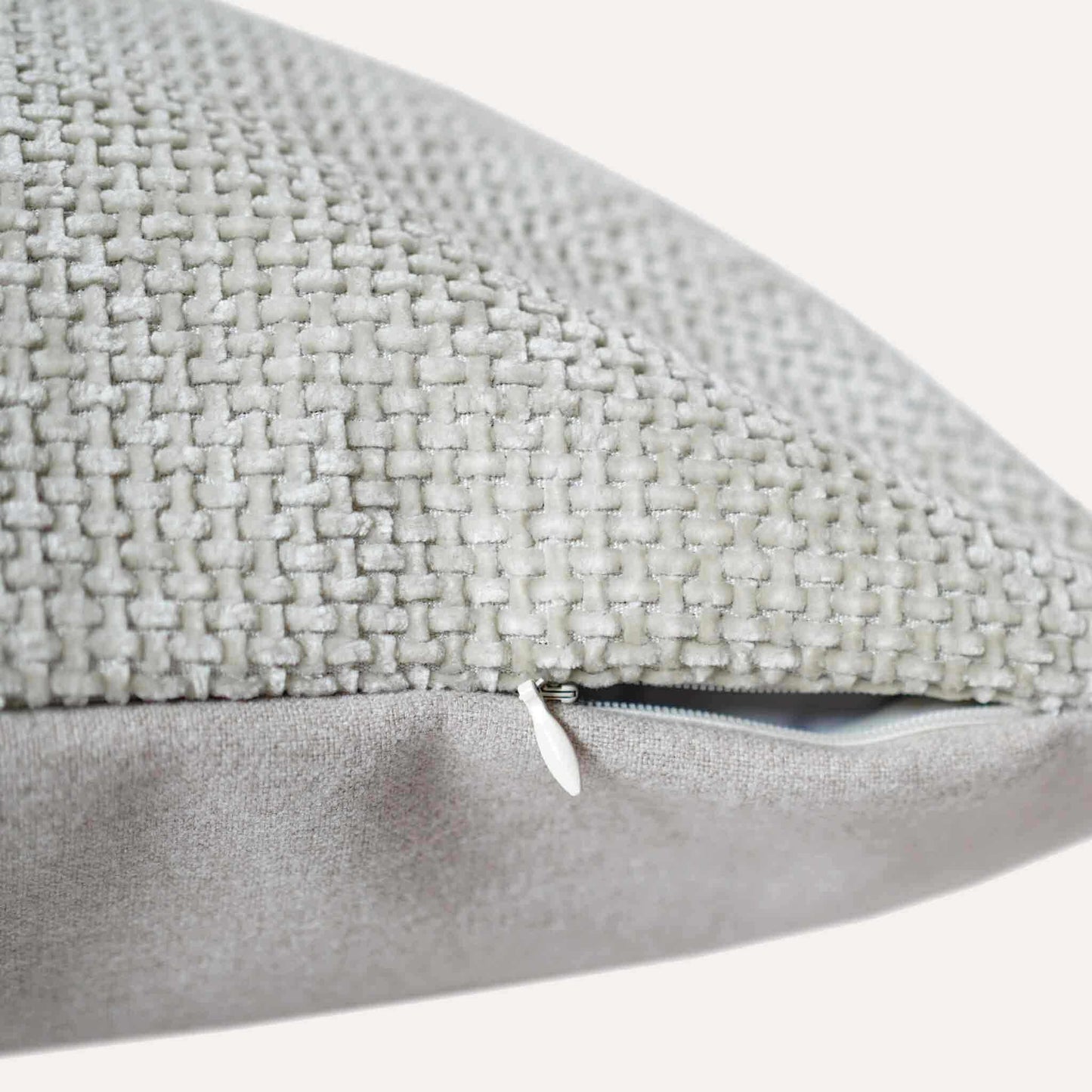 Pale green woven chenille cushion cover with invisible zipper.