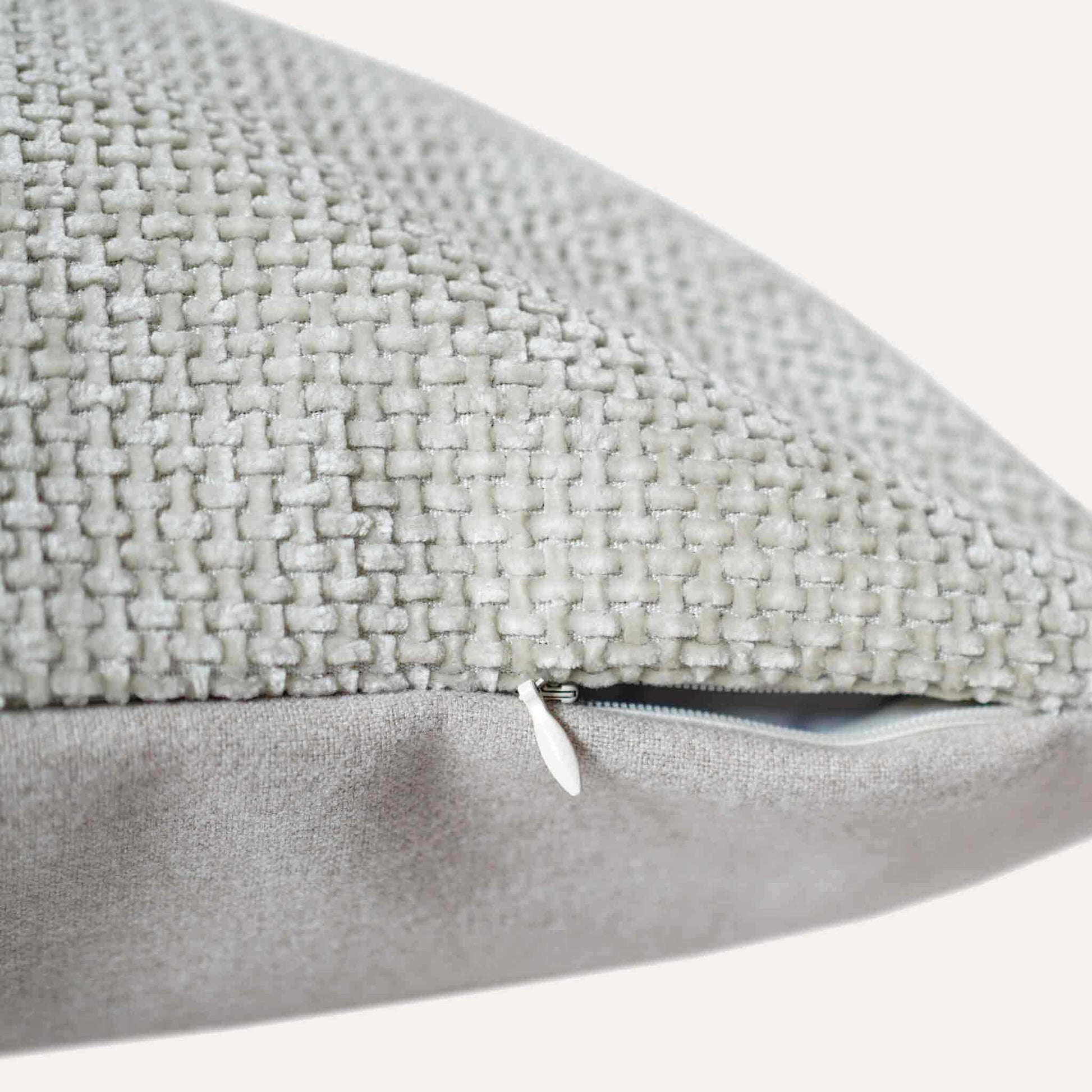 Pale green woven chenille cushion cover with invisible zipper.