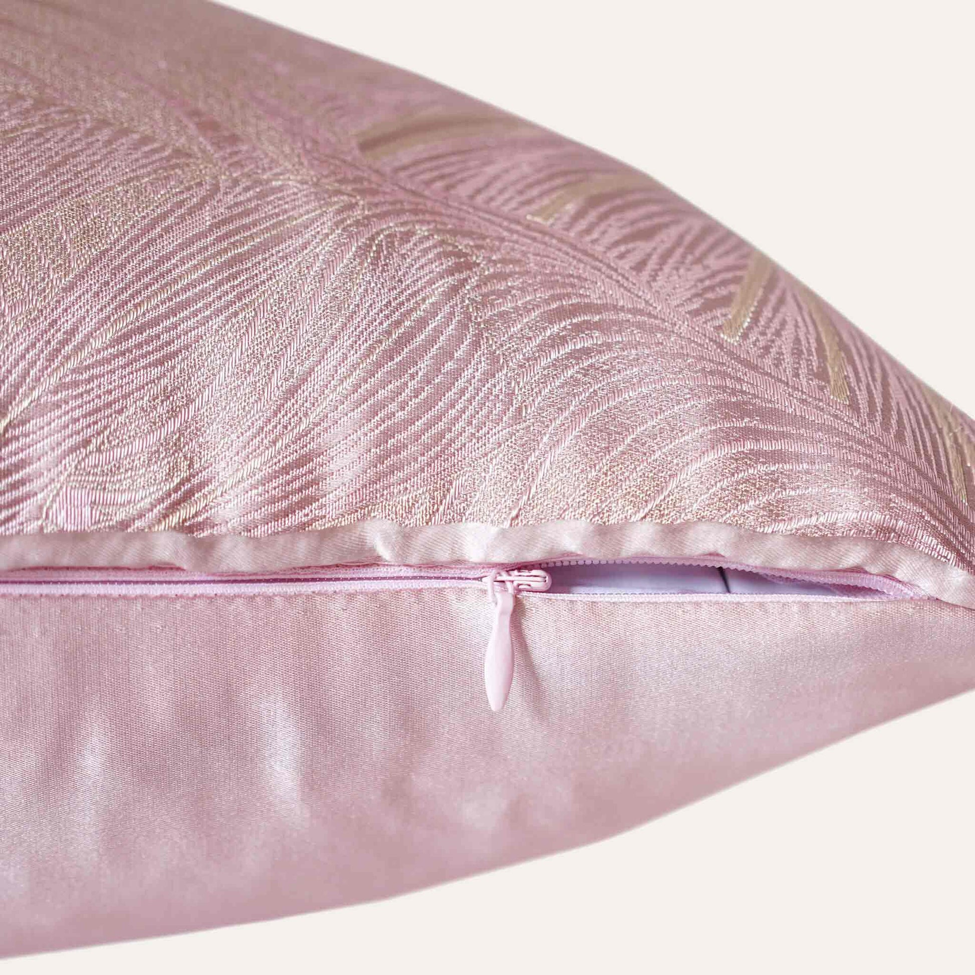 Gentle pink tropical palm leaves polyester decor cushion cover with invisible zipper.